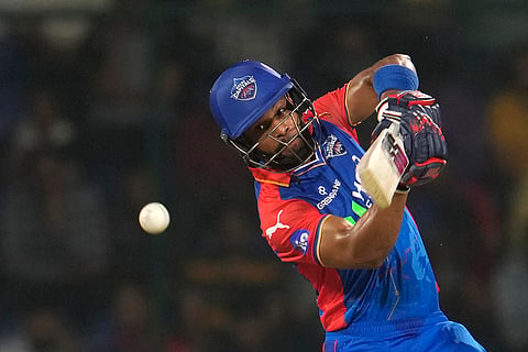 Shai Hope plays a shot